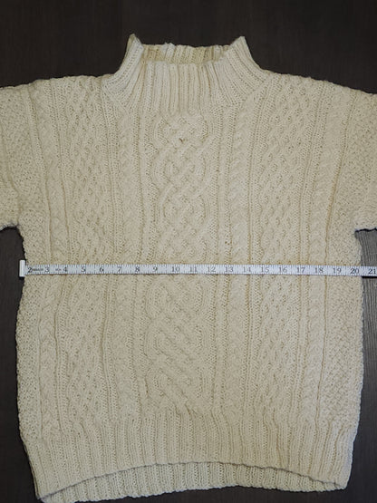 Turtleneck cable designed knitted jumper