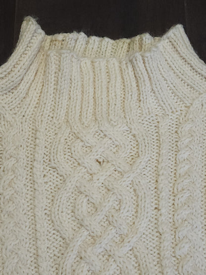 Turtleneck cable designed knitted jumper